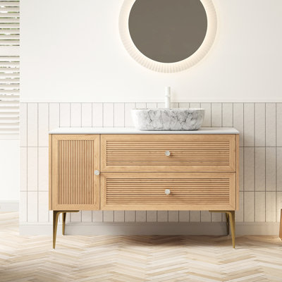 Meuble-lavabo autoportant de 48 po avec plateau en pierre frittée, 1 porte et 2 tiroirs, lavabo rectangulaire en céramique à motif marbré blanc, comptoir en chêne
