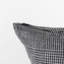 Housse de coussin blanc et noir