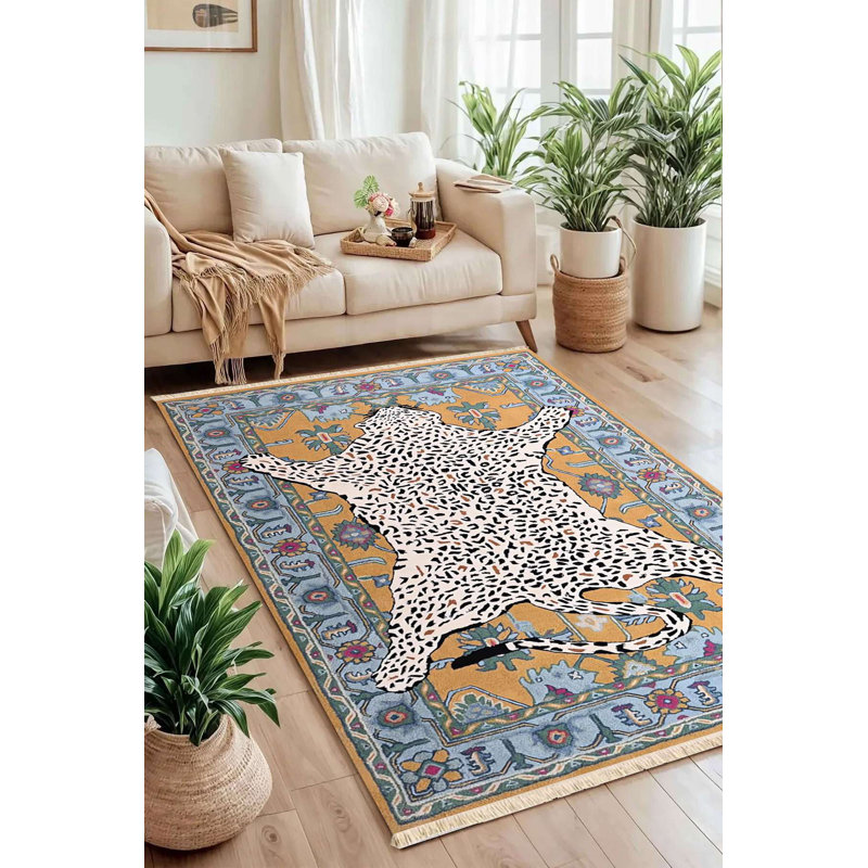 Tapis blanc en peau de léopard