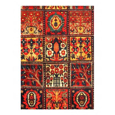 Hanan Hand Knotted Area Rug in Red