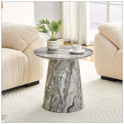 Table basse ronde grise texturée avec pieds réglables