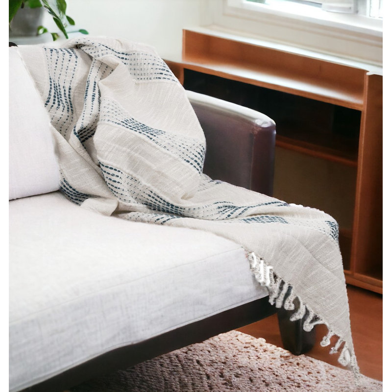 Jeté en coton tissé gris avec frange