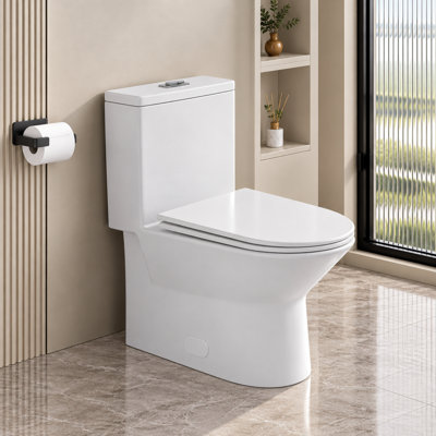 Toilette monobloc 1,1 / 1,6 GPF 17 po de hauteur ADA à double chasse sans rebord, siphon S-trap 12 po avec siège à fermeture douce, blanc brillant