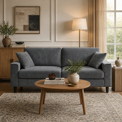 Canapé rembourré confortable en velours côtelé avec structure robuste et accoudoirs carrés pour les espaces de vie modernes