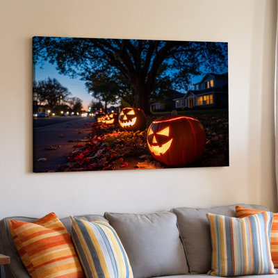 Canvas A Serene Halloween Scene At Twilight Featuring Several Carved Pumpkins Wall Art Glowing Warmly On A Sidewalk Their Orange Hues Canvas Wall Art