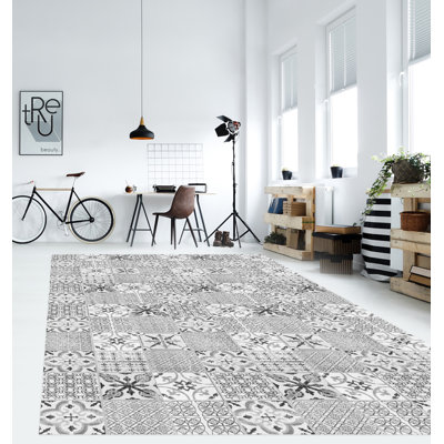 Sagrario Vinyl Machine Printed Area Rug