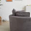 Grand fauteuil club rond moderne avec repose-pieds
