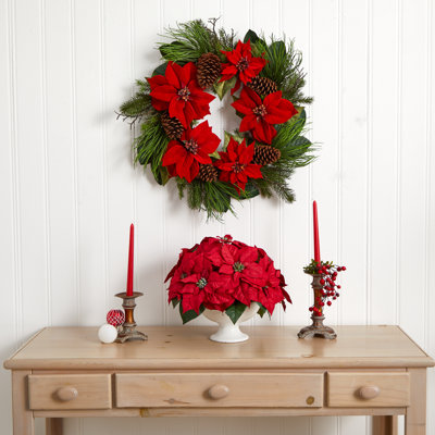 Arrangement floral poinsettia dans un vase