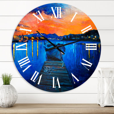 Bateaux qui se reposent sur l'eau pendant un coucher de soleil chaud III - horloge murale nautique et côtière