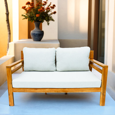 Causeuse d'extérieur en bois d'acacia avec coussins