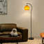 Lampe sur pied moderne avec abat-jour sphérique en verre orange et lampe sur pied en fer noir