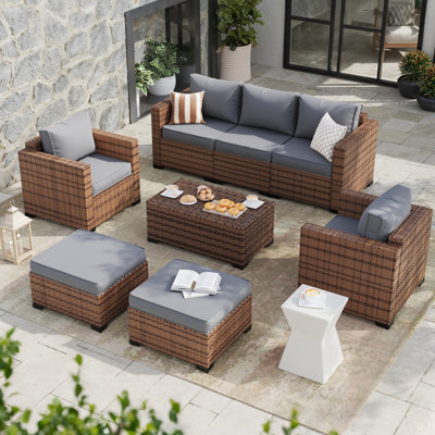 Wicker Sofa Seating Group with Storage Deck Box and Ottomans