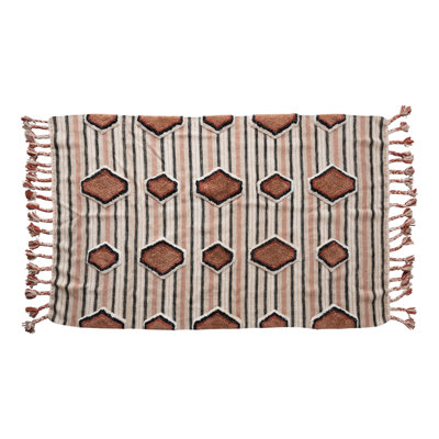 Tapis kilim en coton touffeté à pampilles tressées
