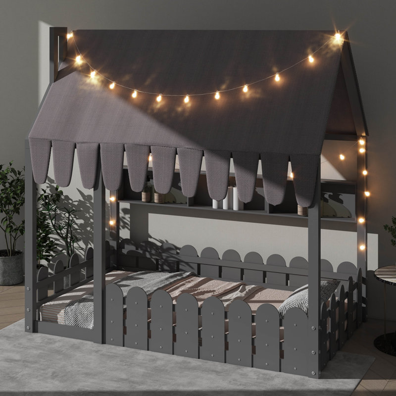 Lit de sol pour enfants d'inspiration Montessori avec barrière de sécurité, auvent, éclairage et trois compartiments de rangement