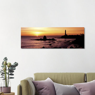 Silhouette Of A Lighthouse At Sunset, Pigeon Point Lighthouse, San Mateo County, California, USA by Panoramic Images - Wrapped Canvas Panoramic Print