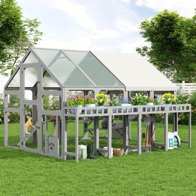 Grande maison de chat en bois pour l'extérieur avec support à fleurs pour plusieurs chats, boîtes de repos, pont, plateformes et housse imperméable