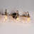 Almine 23" W 3-Light Iron Vanity Light with Textured Glass Shades