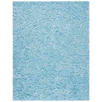 Hermina Light Turquoise Area Rug