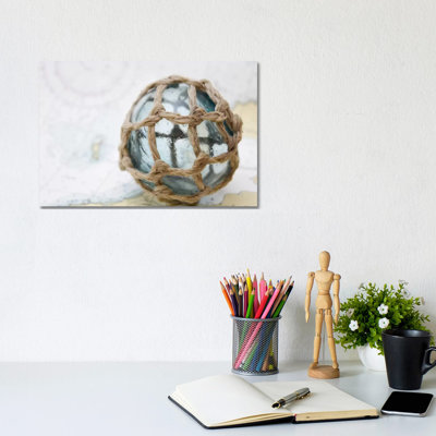 Fishing Float On Chart by Savanah Plank - Wrapped Canvas Print