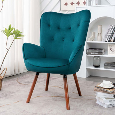 Fauteuil à oreilles Mid-Century moderne avec capitonnage et pieds en bois massif