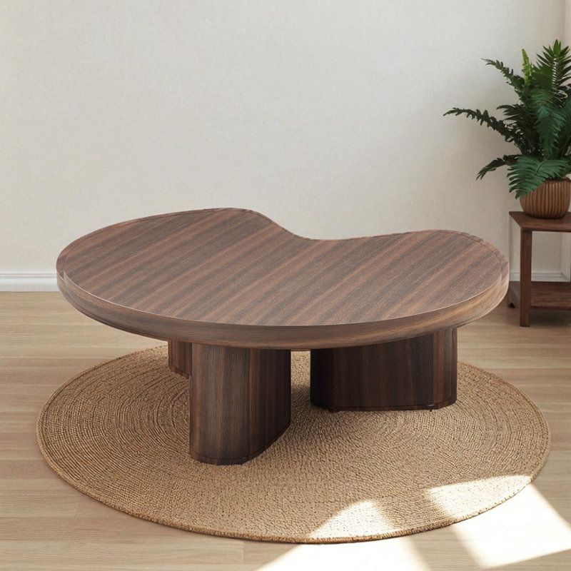 Table basse moderne en chêne fumé avec base sculpturale
