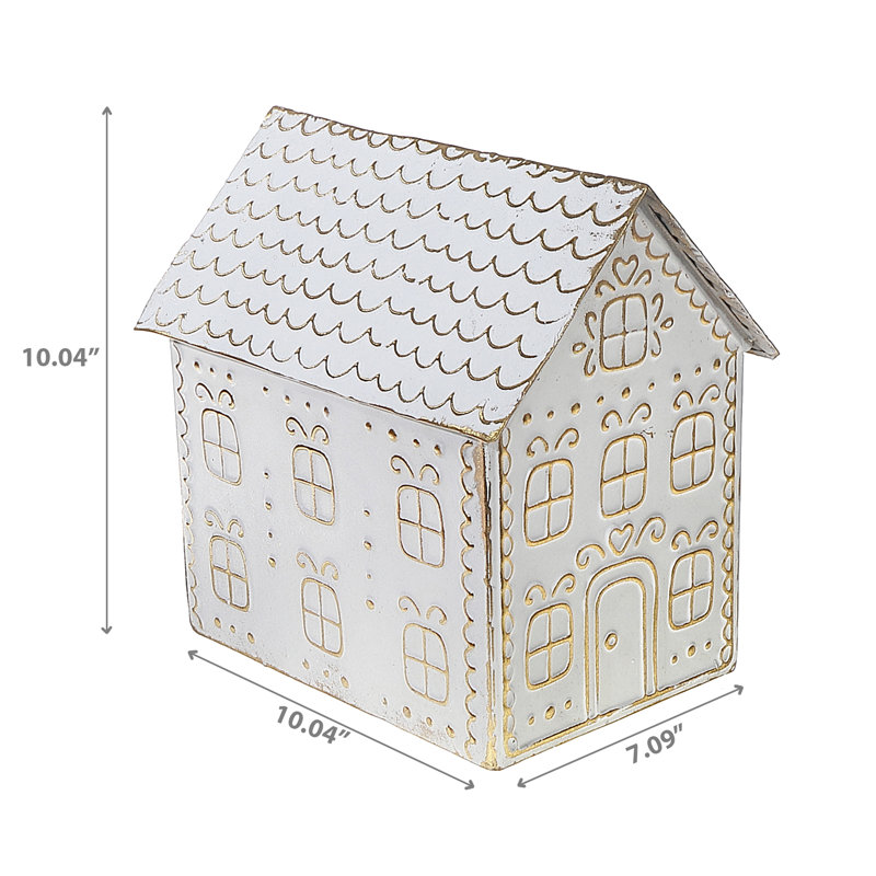 Maison de pain d'épices dorée et blanche
