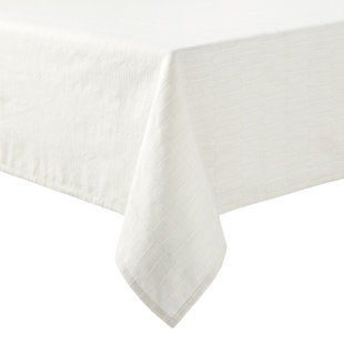 Smooth, fine-quality linen tablecloth in 100% European linen. Wide hemmed  borders and mitered corners are el…