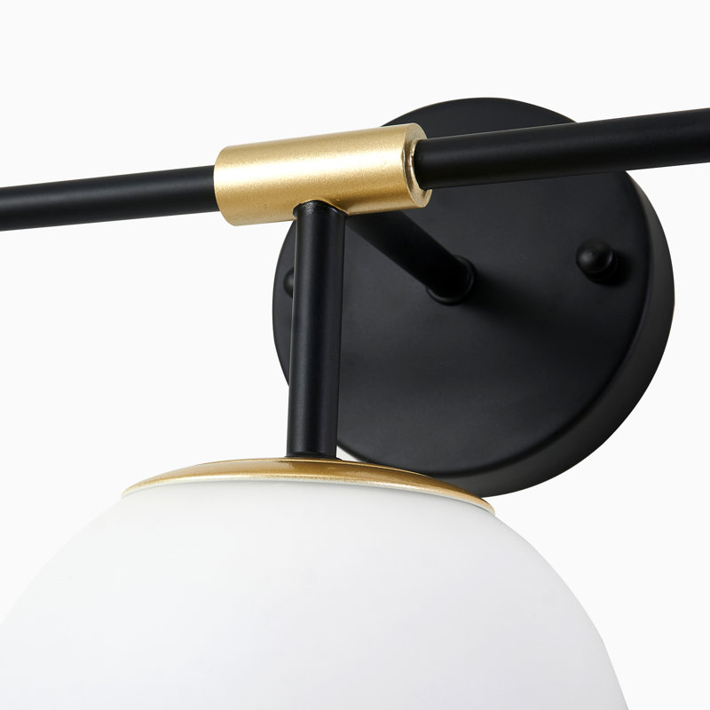 Éclairage pour meuble-lavabo sphérique à trois lumières