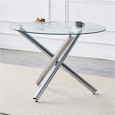 glass round table.Modern and simple, stylish choice: A glass round table with three metal table legs interspersed gives you timeless elegance.