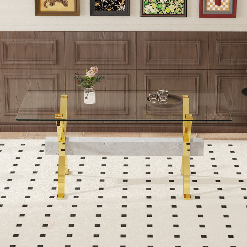 Table de salle à manger moderne en verre trempé avec pieds plaqués or et barres transversales en bois aggloméré gris, idéale pour la maison et le bureau