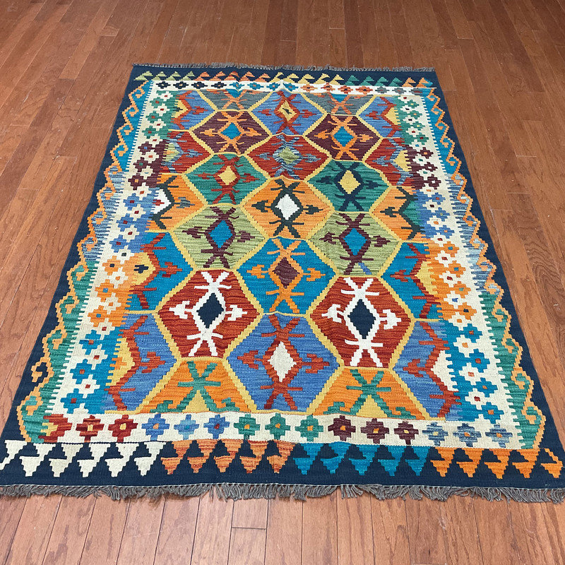 Tapis unique bleu, brun et jaune de 4 pi 5 po x 6 pi 7 po