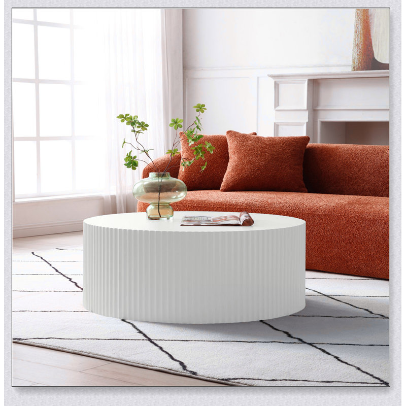 Table basse ronde avec relief fabriqué à la main