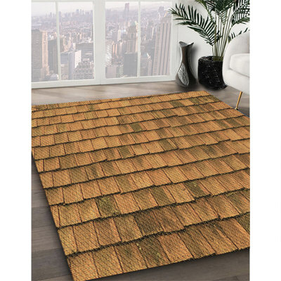 Tapis brun tissé à la machine