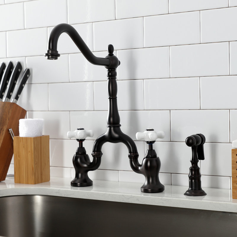 Kingston Brass English Country Two-Handle 3-Hole Deck Mount Bridge Kitchen Faucet with Brass Side Sprayer, Oil Rubbed Bronze