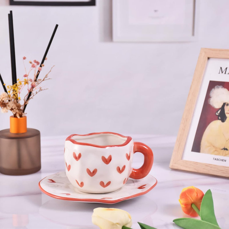 Irregular ceramic cup with dish