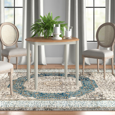 Deerfiled Extendable Oak Round Solid Wood Dining Table