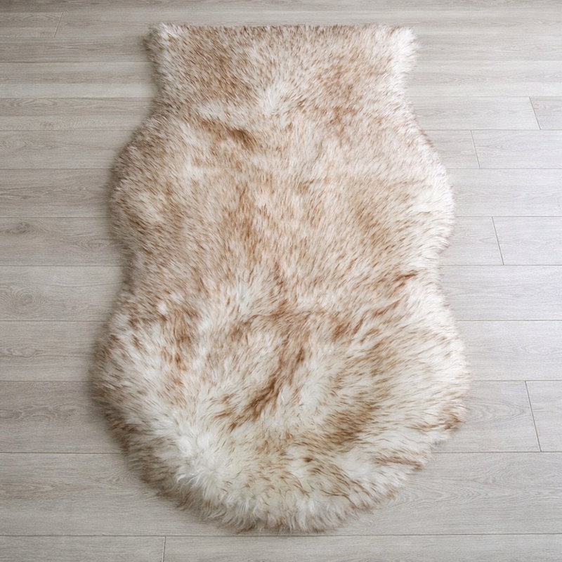 Oval Solid Colour Sheepskin 60cm X 110cm Area Rug, Brown