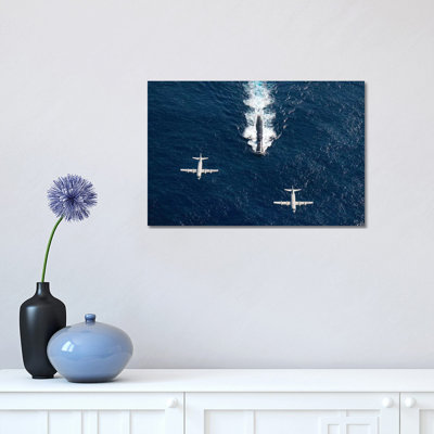 Two P-3 Orion Maritime Surveillance Aircraft Fly Over Attack Submarine USS Houston by Stocktrek Images - Wrapped Canvas Print