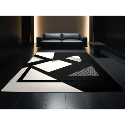 Tapis à motif géométrique moderne et contemporain lavable à la machine bleu et noir Roslindale