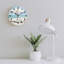 Horloge murale 12 po x 12 po Highland Cow