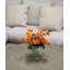 Renoncule artificielle dans un vase
