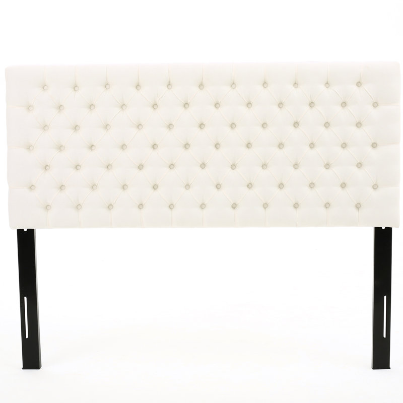 Élégante tête de lit pour grand lit, avec un design moderne et chic, un capitonnage à losanges robuste et élégant