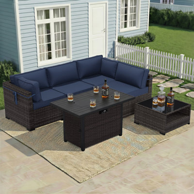 Ensemble de salon de jardin modulaire en rotin toutes saisons 4 personnes avec coussins et table foyer
