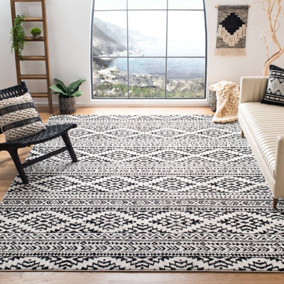 Talkington Geometric Looped / Hooked Area Rug