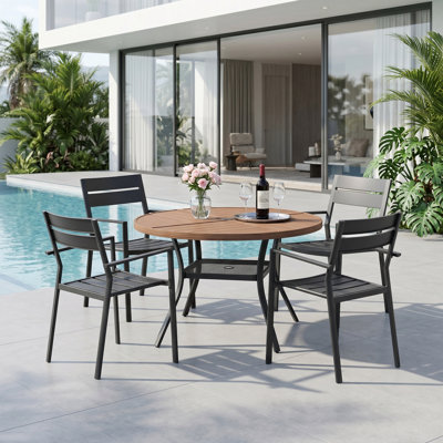 4-Person Round Patio Dining Set With Stackable Chairs