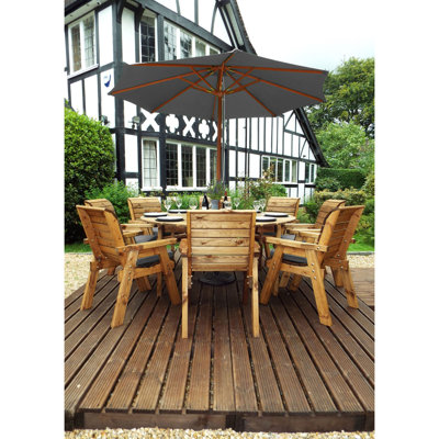 Farris 8 - Person Round Solid Wood Patio Dining Set with Cushions included