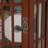 Corner Curio Cabinet With Four Adjustable Tempered Glass Shelves And Integrated Lighting System For Displaying Precious Items