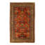 Melaku Oriental Area Rug in Rust