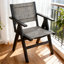 Chaise de salle à manger Hips avec assise tressée confortable, gris anthracite, adaptable à plusieurs ambiances, idéale pour un décor nordique de style chalet.