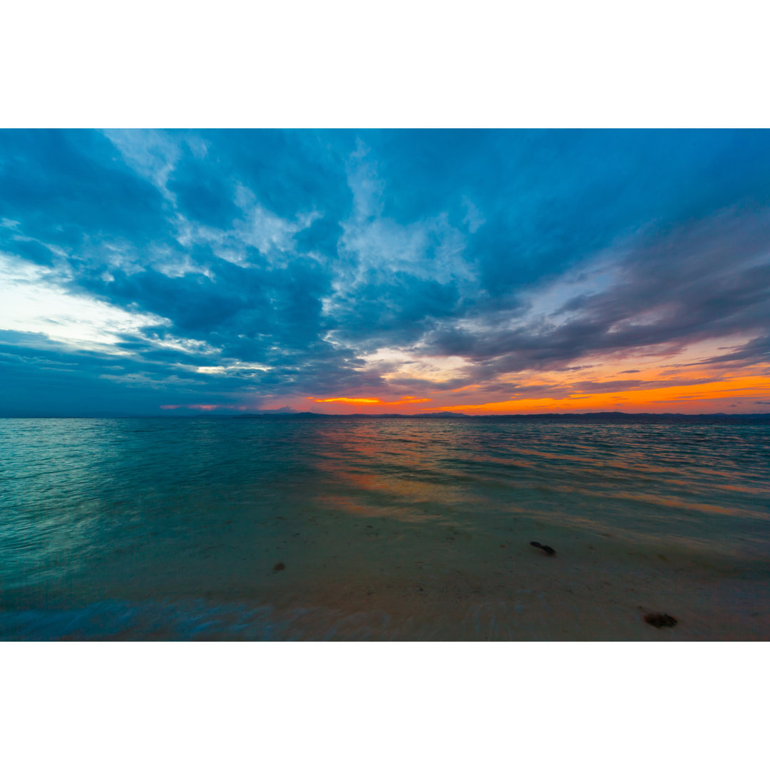 Tropischer Sonnenuntergang am Meer- Leinwandbild